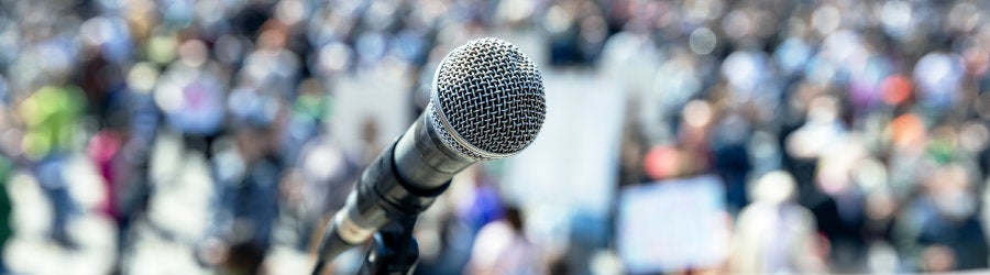 Microphone with crowd in background